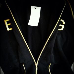 New with Tags BCBG zip up hooded sport jacket.