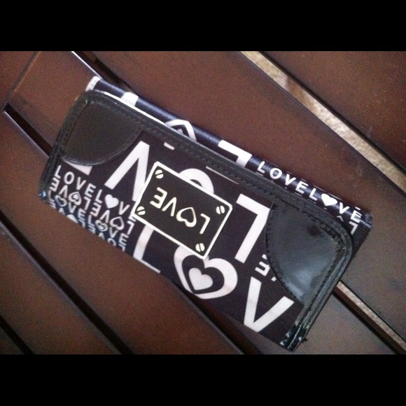 Black and white wallet. Like new.