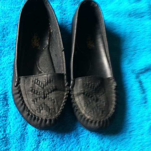 Black leather flats