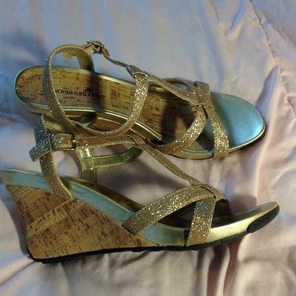 Never worn fabulous 3" wedge sandals.