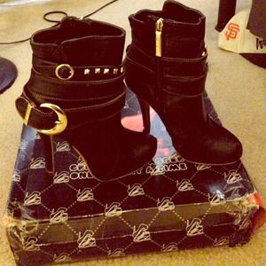 Black and gold boots