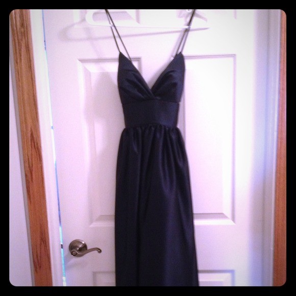 Floor length navy blue spaghetti strap gown