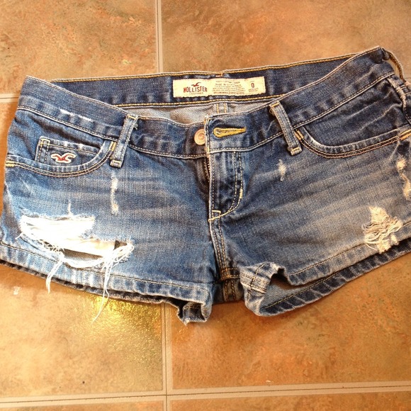 Medium wash destroyed Hollister jean shorts