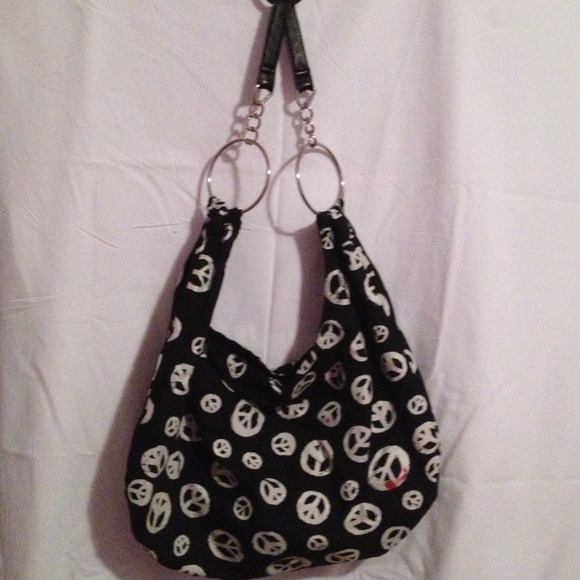 Black slouchy bag with white peace signs