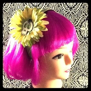 Wide satin headband featuring a green flower skull