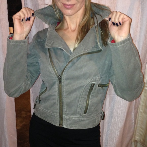 Military jacket with many zippers