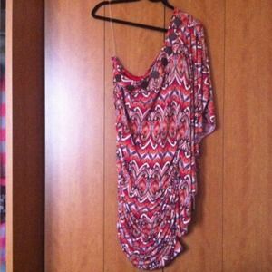 One-sleeved African-inspired dress