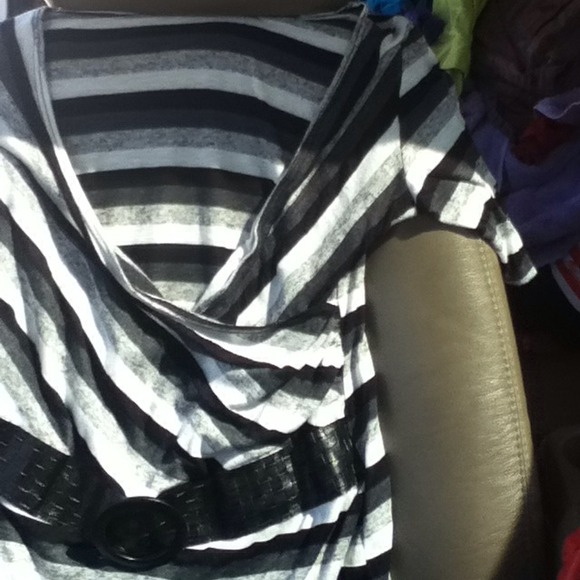 I am selling a black/white and gray striped shirt.