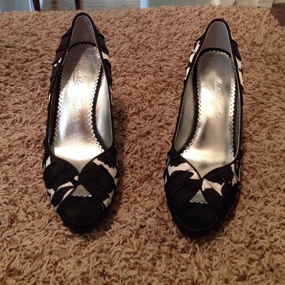 Black and white floral shoes. Only worn once!