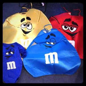 M&M Halloween costumes. Two adult & infant.