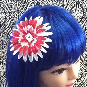Hair Flair red &white poker theme flower.