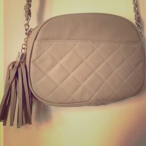 Beige quilted handbag