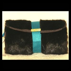 Super cute faux fur cosmetic bag in deep chocolate Super cute faux fur cosmetic bag in deep chocolate