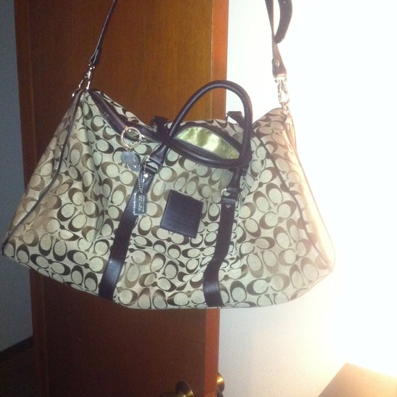 Large coach luggage bag! Brown and light brown.