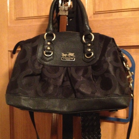 Black larger size handbag with coach label