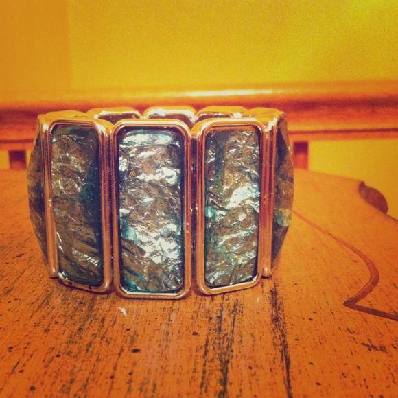 Turquoise and silver chunky bracelet.