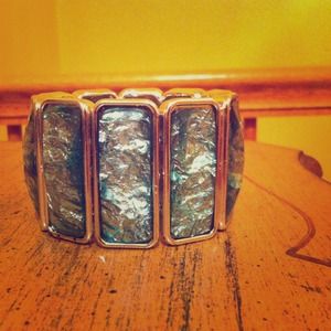 Turquoise and silver chunky bracelet.