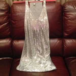 Sequined silver tank top. Racer back. Never worn!