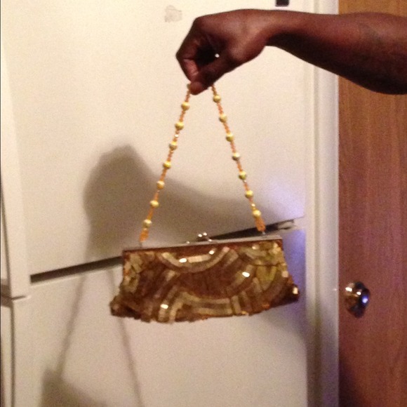 *REDUCED* Gold clutch $8