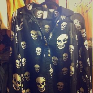 Skull long sleeve sheer top.