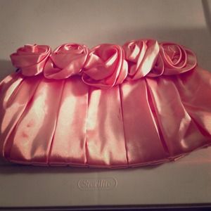 Pink clutch bag with flower design