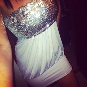 white short clubbing dress . it's brand new.