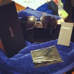 brand new unisex Prada sunglasses.