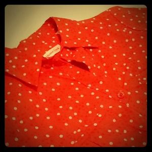 Orange and white polka dot blouse