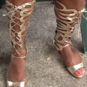 Gold knee high lace up gladiator sandal