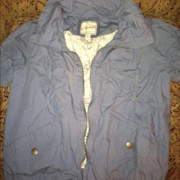 Light blue short sleeve jacket.