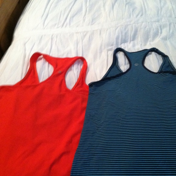 Two lululemon razor back tops size 6..