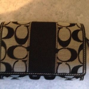 ***RESERVED Authentic Coach wallet***