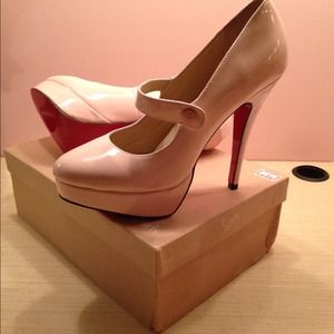 Christian Louboutin nude pumps!