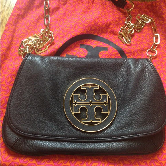 Tory Burch leather clutch w chain. Excellent cond