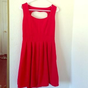 Red dress with heart cutout back.
