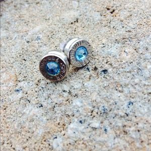 Rhinestone bullet earrings.
