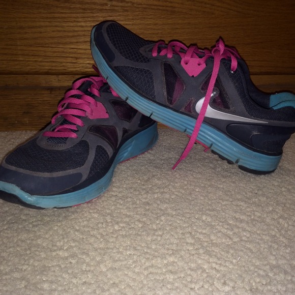 Grey, pink and blue Nike's