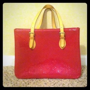 Hot pink, patent leather Louis Vuitton.