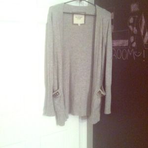 Loose sweater with embellishments