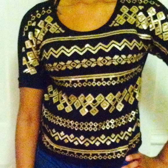 Black and gold tribal decorated shirt