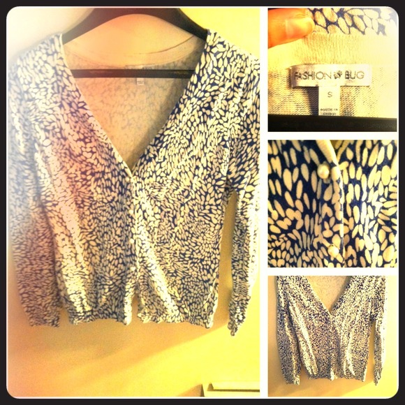 Blue with White speckled sweater.