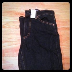 Never worn, high-rise, slim boot jeans by AG.