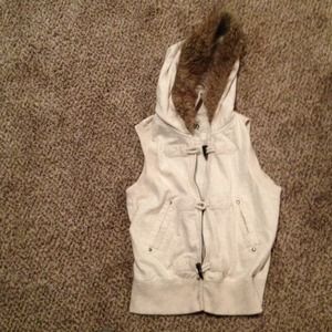 Cream vest with faux fur hood