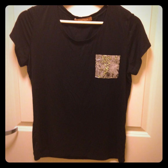 Black rayon top with silver sequenced pocket.