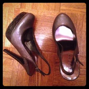 Silver sling back platform heel. Size 6