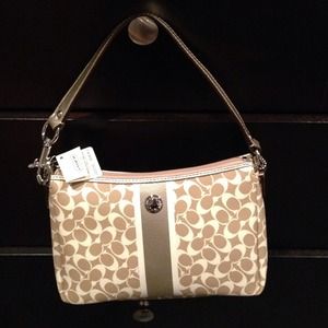 Coach wristlet. Brown and white. Brand new!