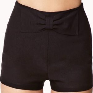 Black high wasted Bebe shorts with a 🎀