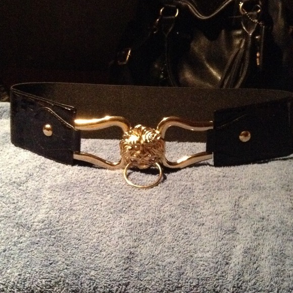 Gold plated lion stretched belt