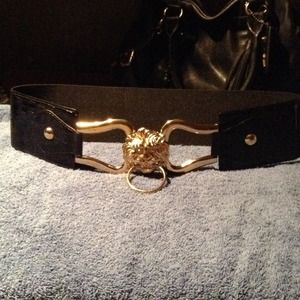 Gold plated lion stretched belt
