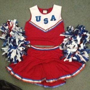 Child's cheerleader costume with pom poms.